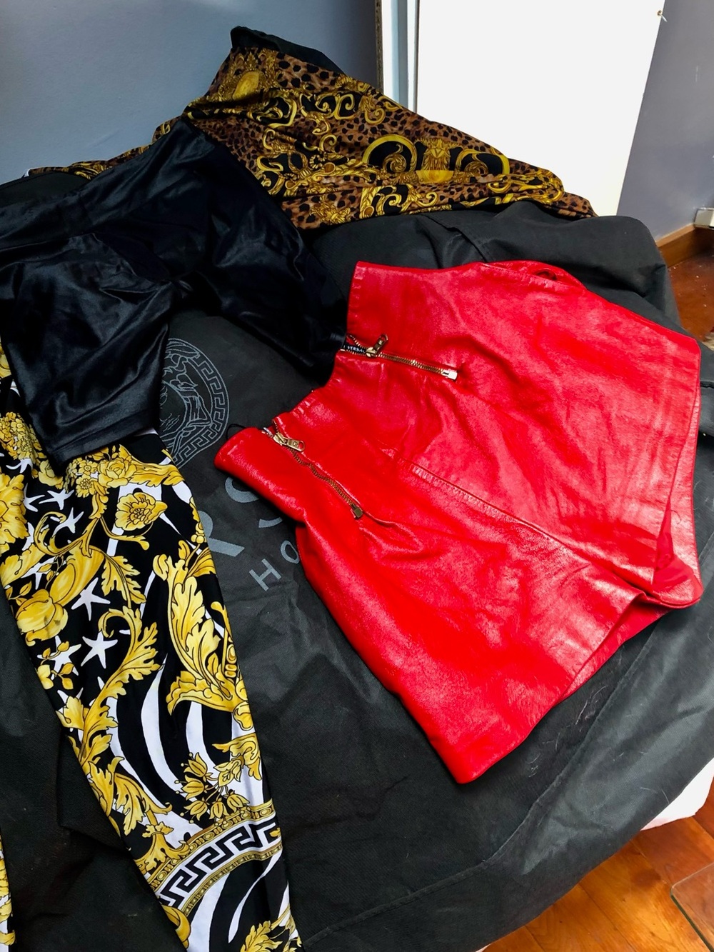 Versace Red High-Waist Leather Shorts with Gold Zippers with silk lining.
